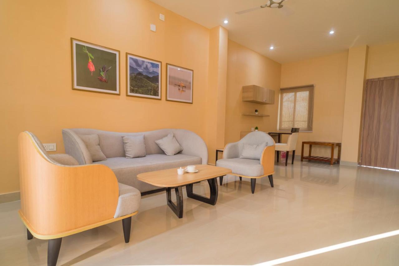 Tusker Tea County Hotel Chalsa Bagian luar foto