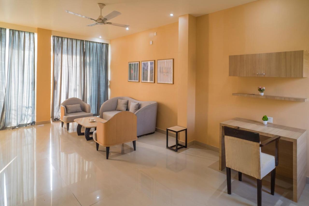 Tusker Tea County Hotel Chalsa Bagian luar foto